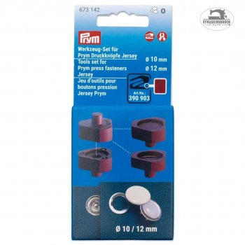 En blå kartong som innehåller verktyg att fästa tryckknappar med.