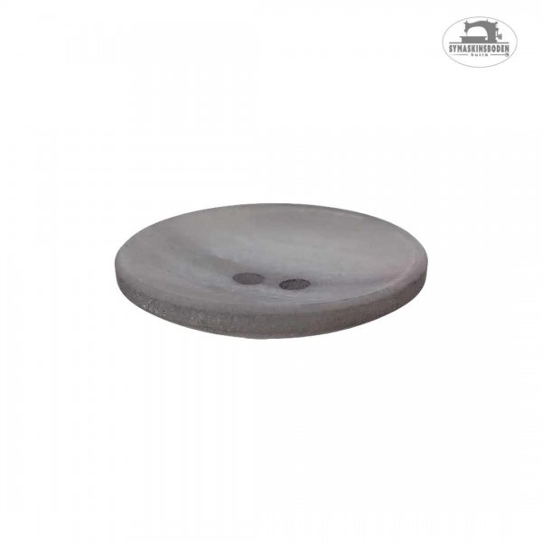 En grå knapp sedd från sidan.