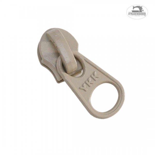 En beige minikläpp till spiralblixtlås på metervara