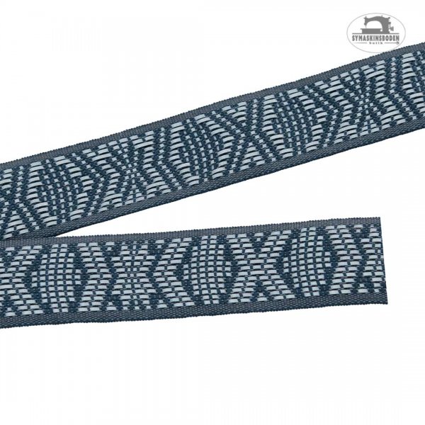 ett grått hemslöjdsband med reflex