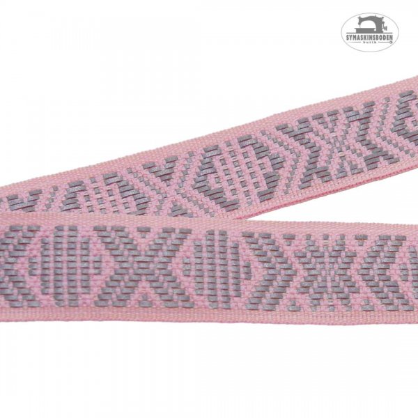 Rosa reflexband med allmogemönster på metervara