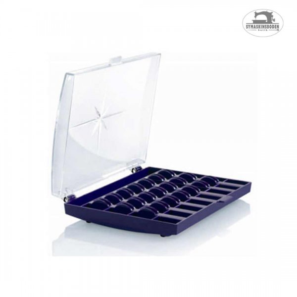 En öppen låda som man förvarar undertrådsspolar i