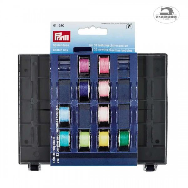 En tom spollåda från prym