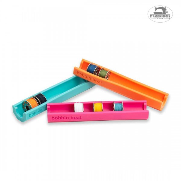 En bild på tre olika spolbåtar med undertrådsspolar i.