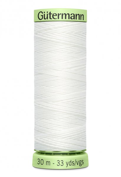 En vit rulle med top stitch tråd
