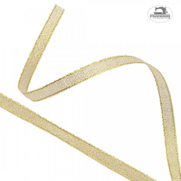 Glittrigt laméband i guld som är 6mm brett