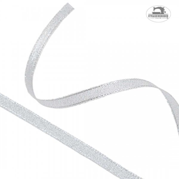 Ett glittrigt silverband som är 6mm brett