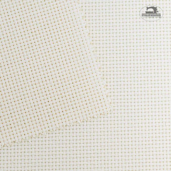 Närbild på aidaväv i färgen ecru