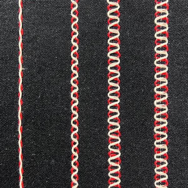 Dekorativa sömmar sydda på en Baby Lock Primo Topcover symaskin