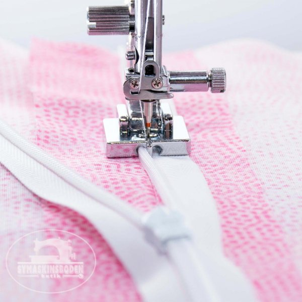 Pressarfot for dolda blixtlås