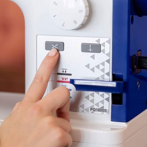 Knapp för trådklipp på Brother PQ1600S