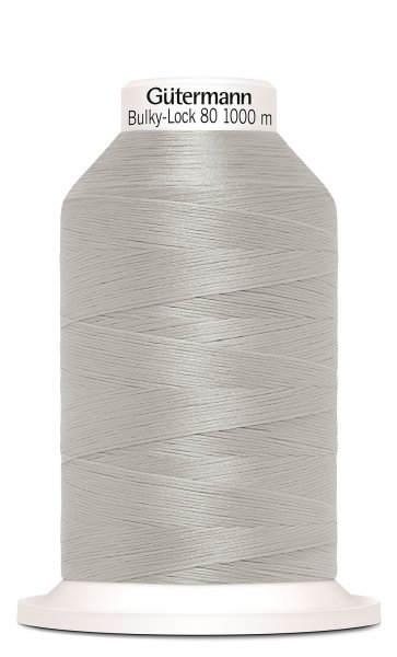 En rulle med ljusgrå bulky-lock tråd