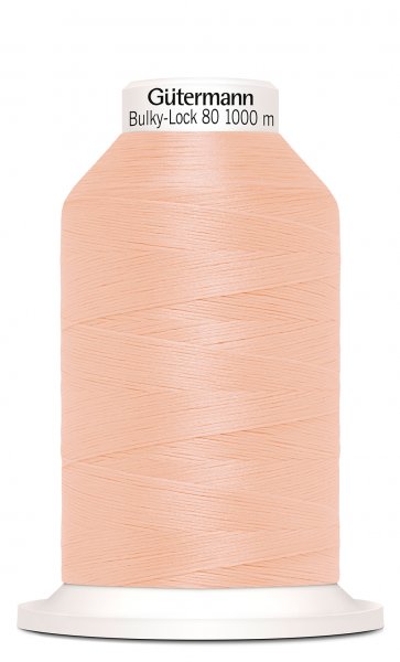 En rulle med rosa bulky-lock tråd