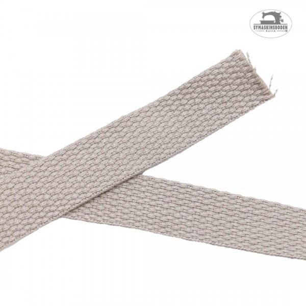 Beiget väskband med struktur som är 20 mm brett