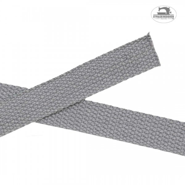 Ett grått band med grov struktur som är 20mm brett