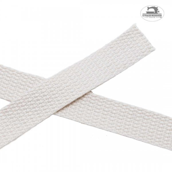 Vitt band med grov struktur som är 20mm brett