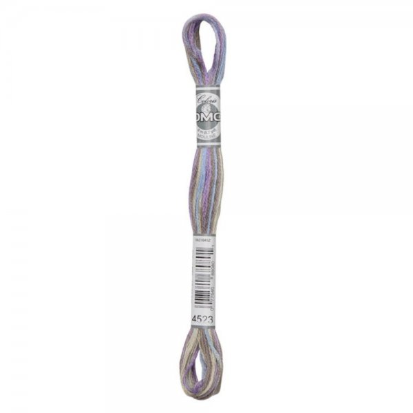 Docka med DMC Mouliné flerfärgat broderigarn. 517-4523