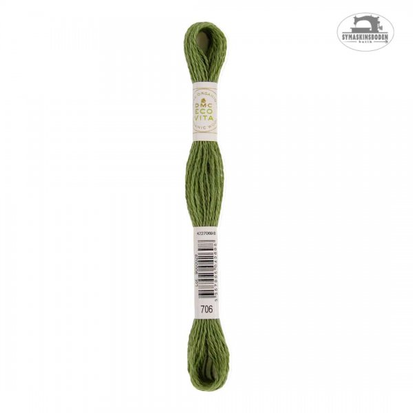 Ett växtfärgat brodergarn i ull i en gräsgrön färg.