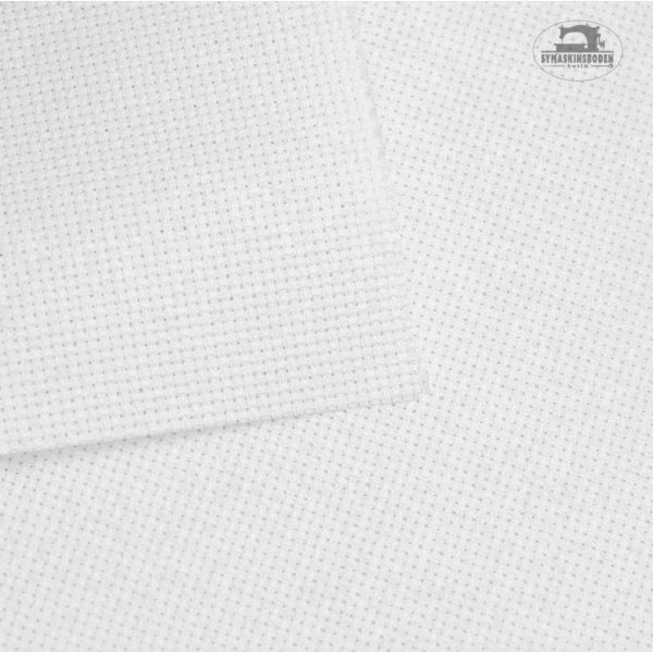 Närbild på vit aidaväv