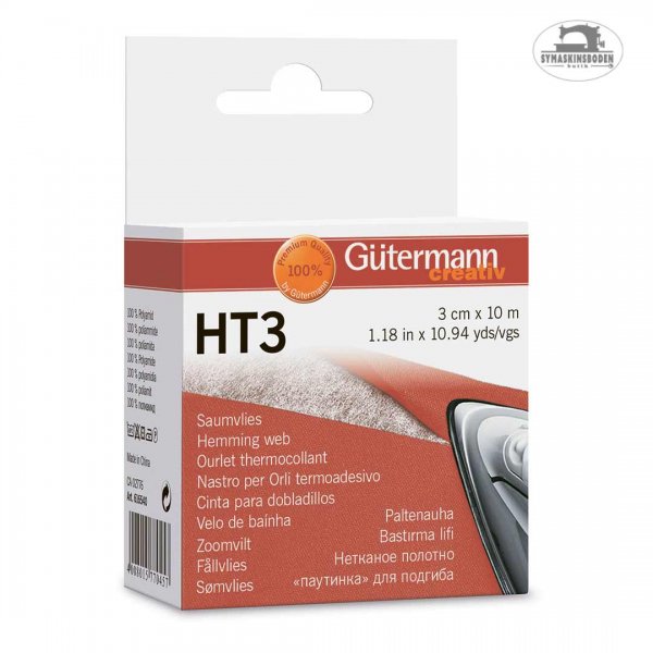 En röd och vit kartong med fållfix från gütermann.