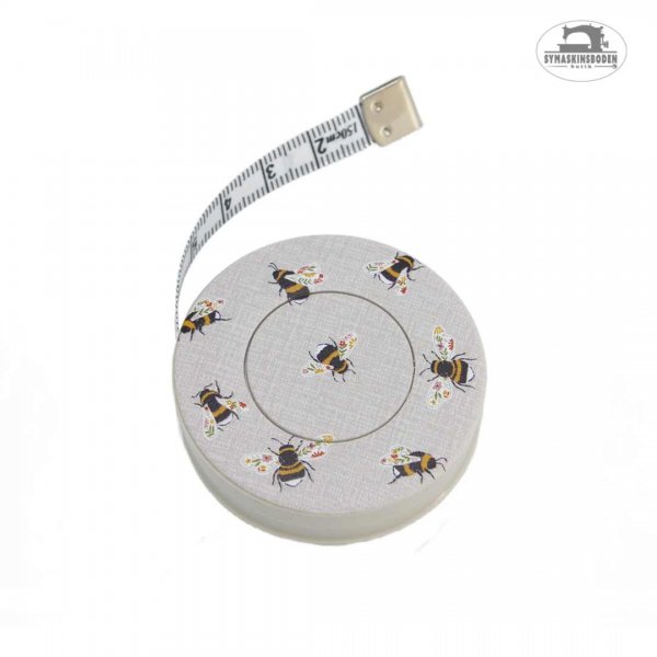 Ett sött måttband med motiv av humlor.