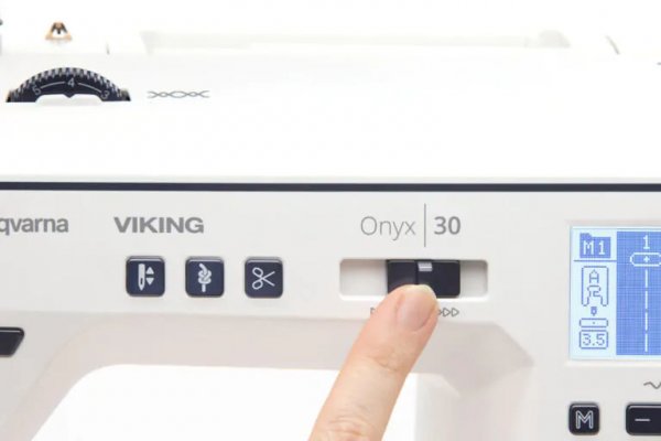 Slider för hastighetsinställning på en Husqvarna Viking Onyx 30