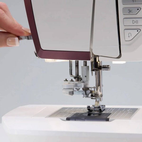 Husqvarna Viking Designer Topaz 65 pressarfotsfäste i metall