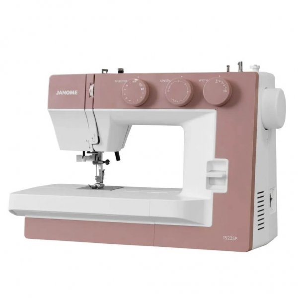 Mekanisk symaskin Janome 1522SP Smokey Pink i vit plast med rökrosa frontpanel och bas, fotograferad i trekvartsvinkel framifrån
