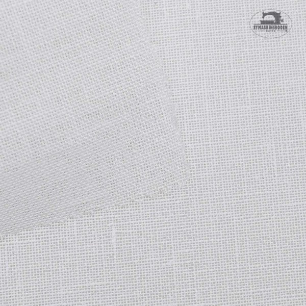 Närbild på linneväv för broderier i vit färg