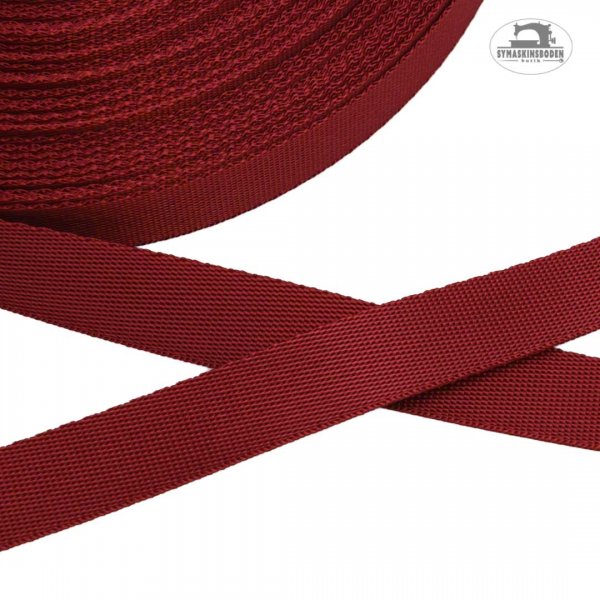 Ett slitstarkt och flexibelt rött nylonband 15 mm