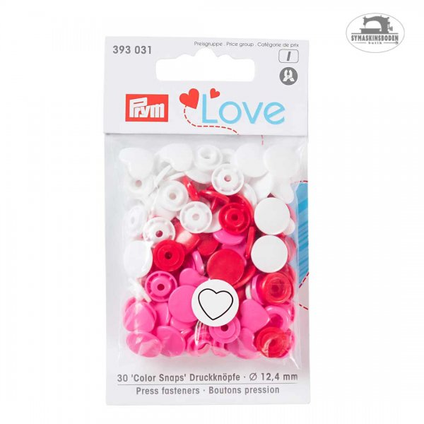 Hjärtfromade tryckknappar i färgerna rosa, röd och vit.