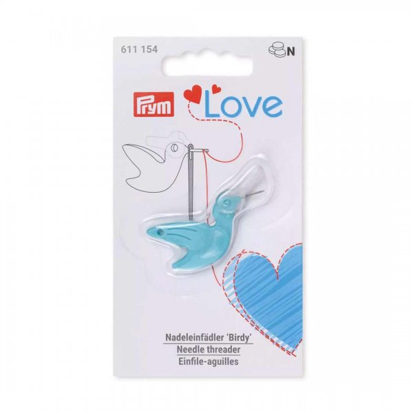 Söt nålträdare i form av en fågel i vit förpackning.