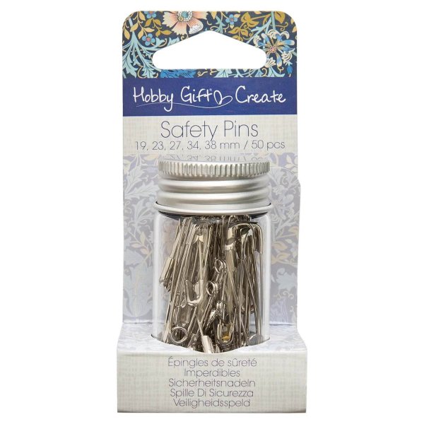 Butiksförpackning för Hobby Gift säkerhetsnålar mot en vit bakgrund. En hängförpackning i kartong med det blommiga mönstret Will