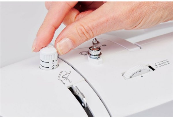 Singer_Elite_CE677_justerbart_pressarfotstryck