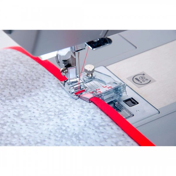 Pressarfot för att sy fast snedslåband med Singer symaskin