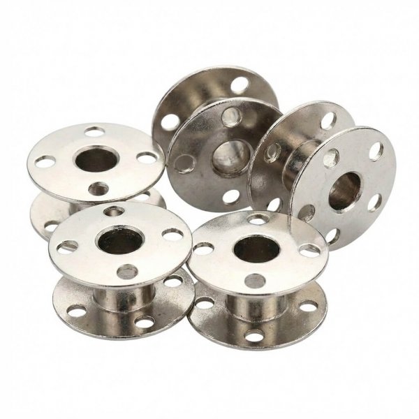 Fem stycken Singer metallspolar för äldre modeller