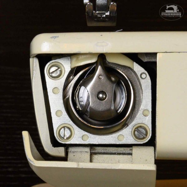 412061245-spolar-ny-husqvarna-gammal