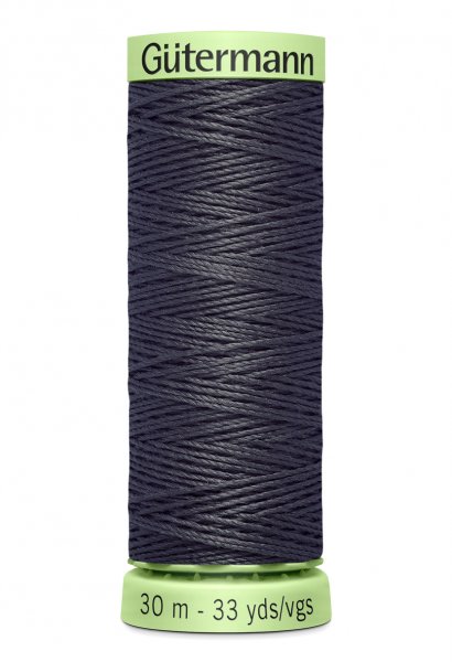En rulle med mörkgrå top stitch tråd
