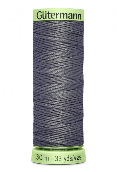 En rulle grå top stitch tråd