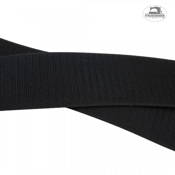 Svart 30mm bred kardborreband med taggarna på.