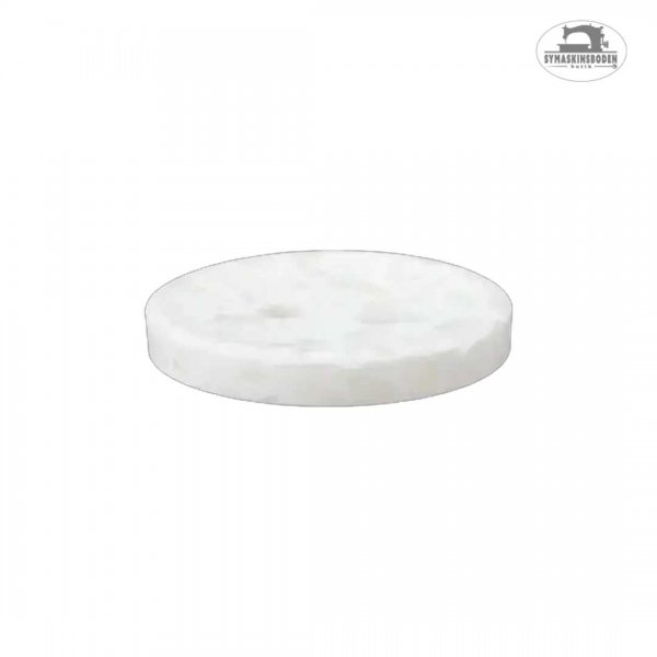 Sidobild av en vit skjortknapp.