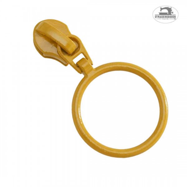 En kläpp med ring i fin lejongul färg