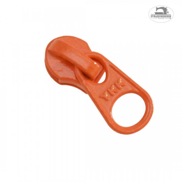 En orange minikläpp till spiralblixtlås på metervara